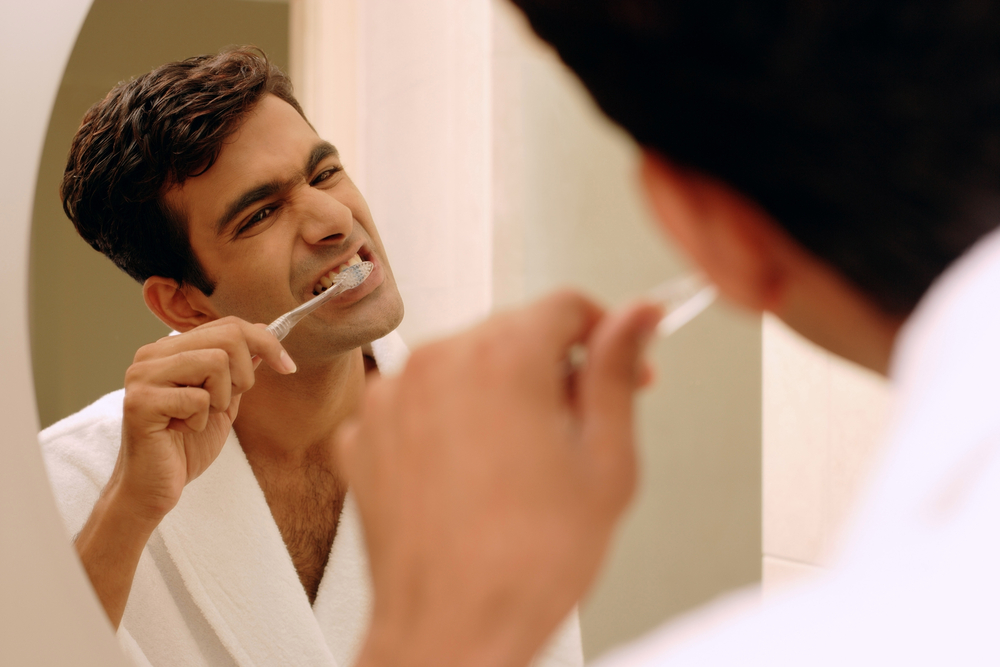 Man brushing his teeth