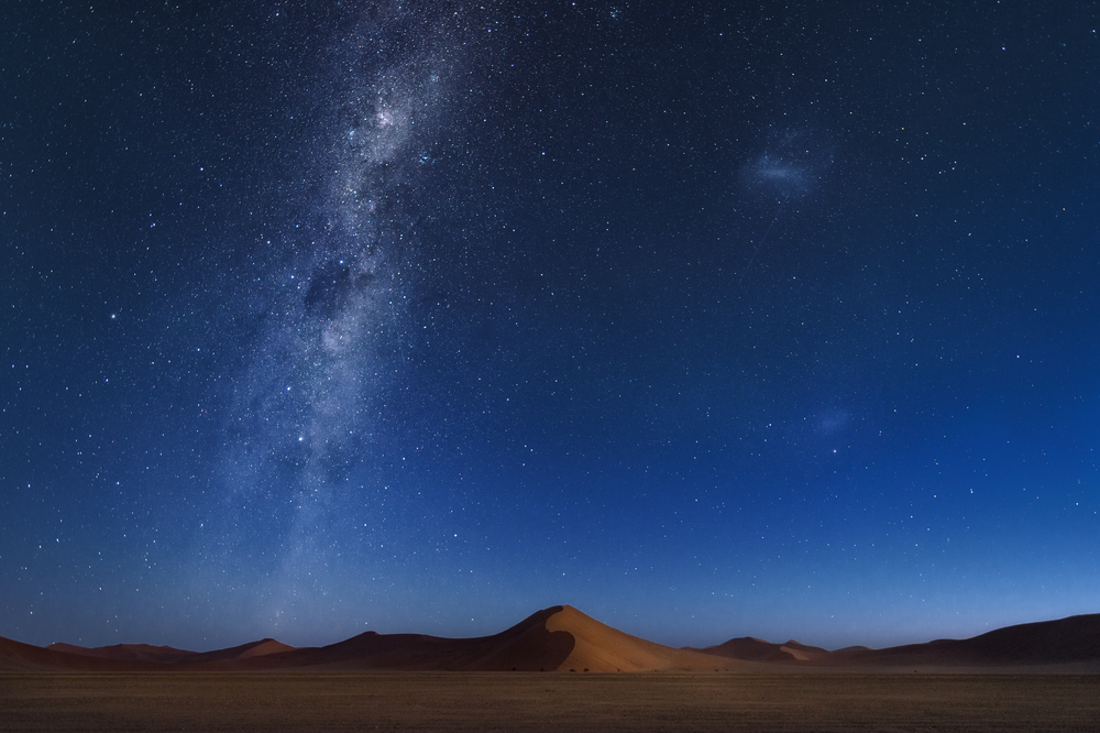 Namib Desert sand dunes with Milky way galaxy, LMC galaxy and SMC galaxy, Sossusvlei, Namibia
