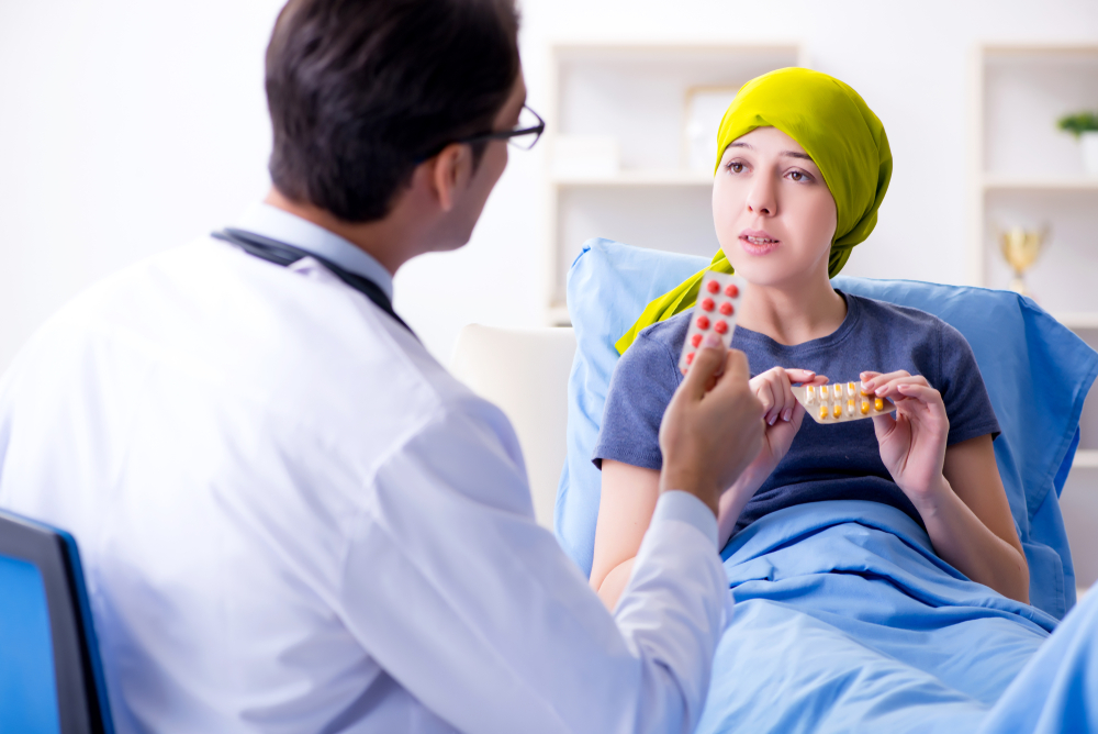 Cancer patient visiting doctor for medical consultation in clini
