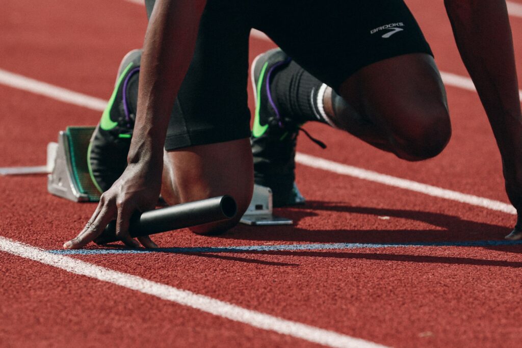 man on running field
