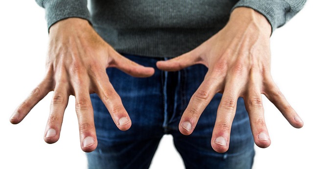 man showing hands to viewer
