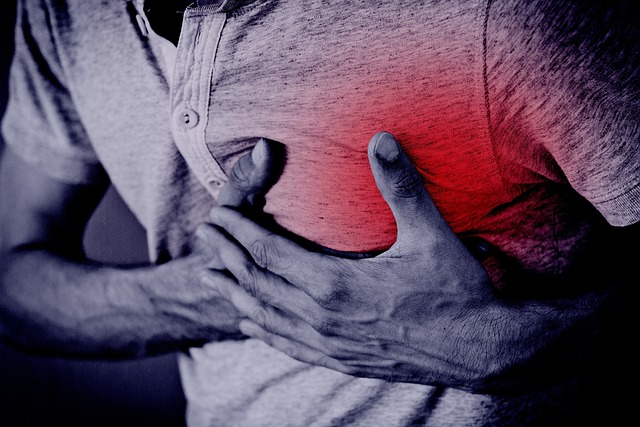 a man holding his chest
