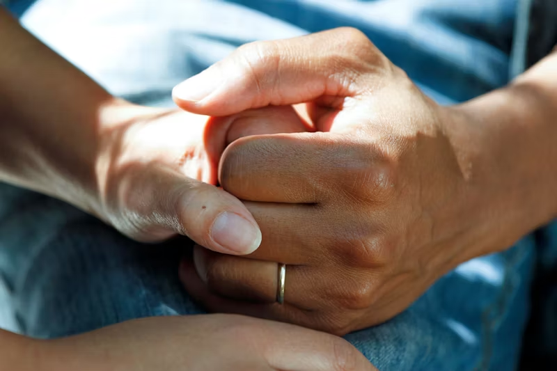 hopeful hands holding each other