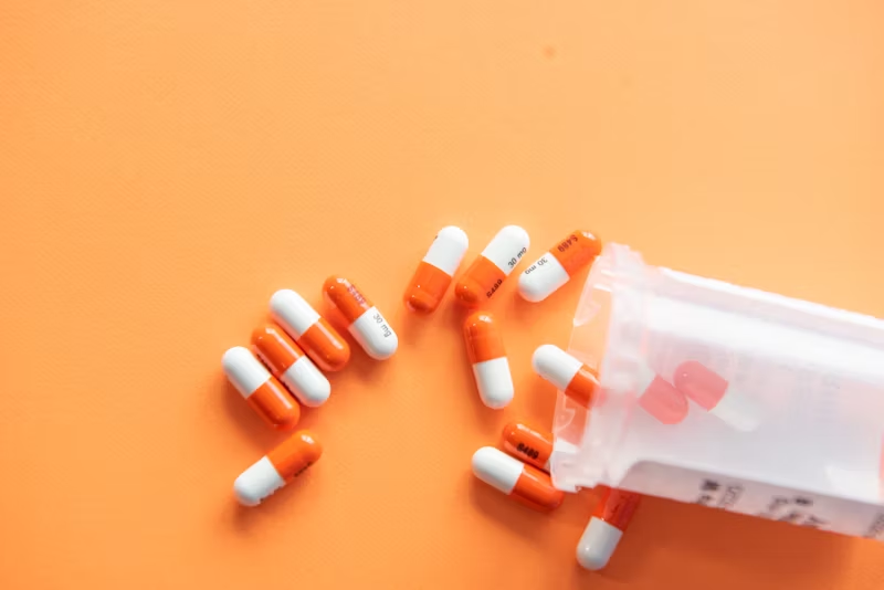 drugs coming out of a container