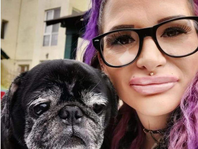 Adriana Naegoe and one of her pugs