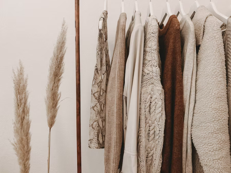A decluttered clothing rack displaying various garments neatly hung for easy viewing and selection.