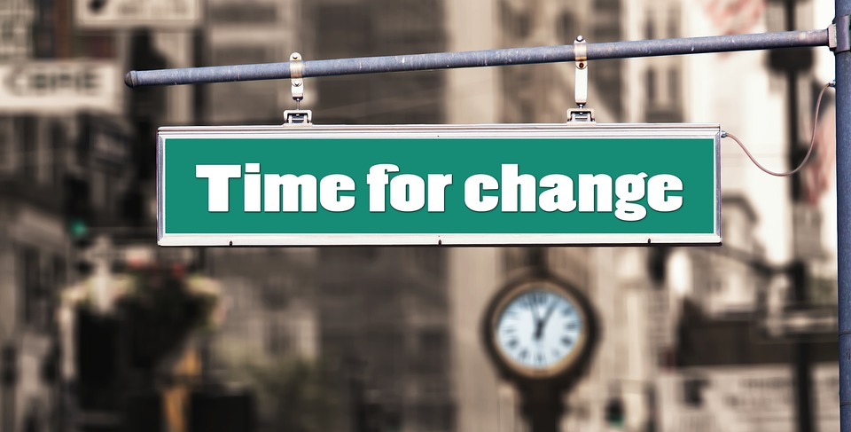A green sign displaying the phrase