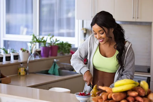 woman preparing a healthy meal in kitchen