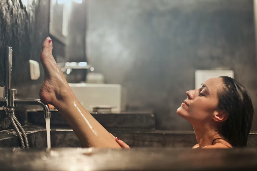a woman in the tub relaxing