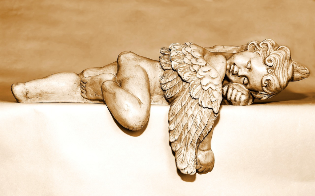 statue of an angel sleeping