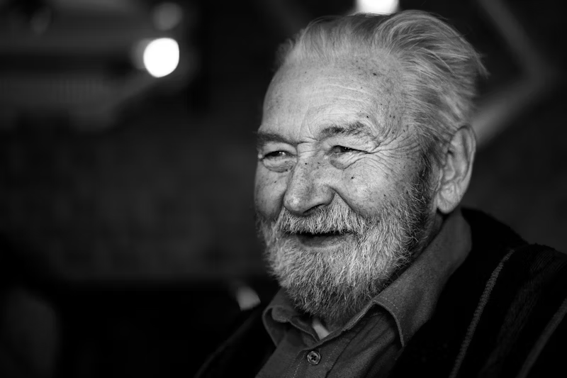 a smiling elderly gentleman