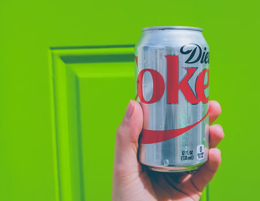 a can of Diet Coke in someone's hand