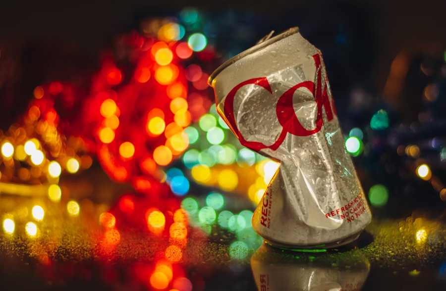 a crushed can of Diet Coke