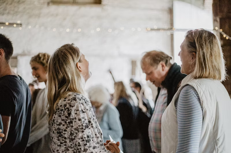 a group of people together at an event