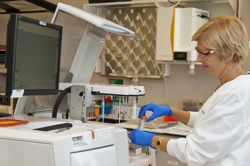 woman working on medical instruments