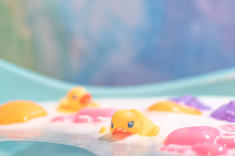 some rubber ducks in a bath
