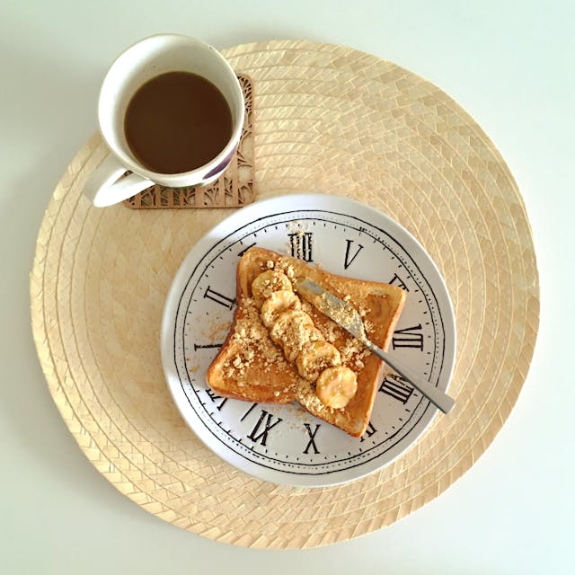 toast on a plate that looks like a clock