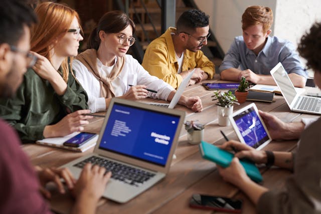 people working around a table