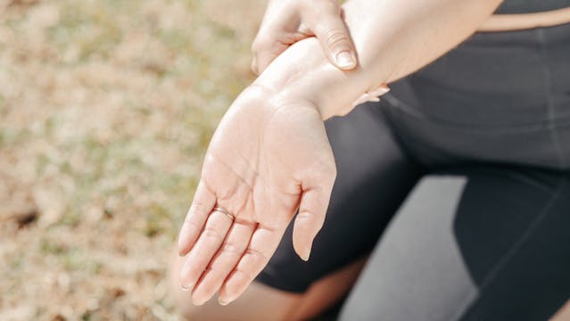woman with joint pain in wrist