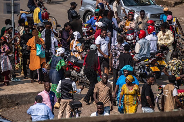 a group of people in public in Africa