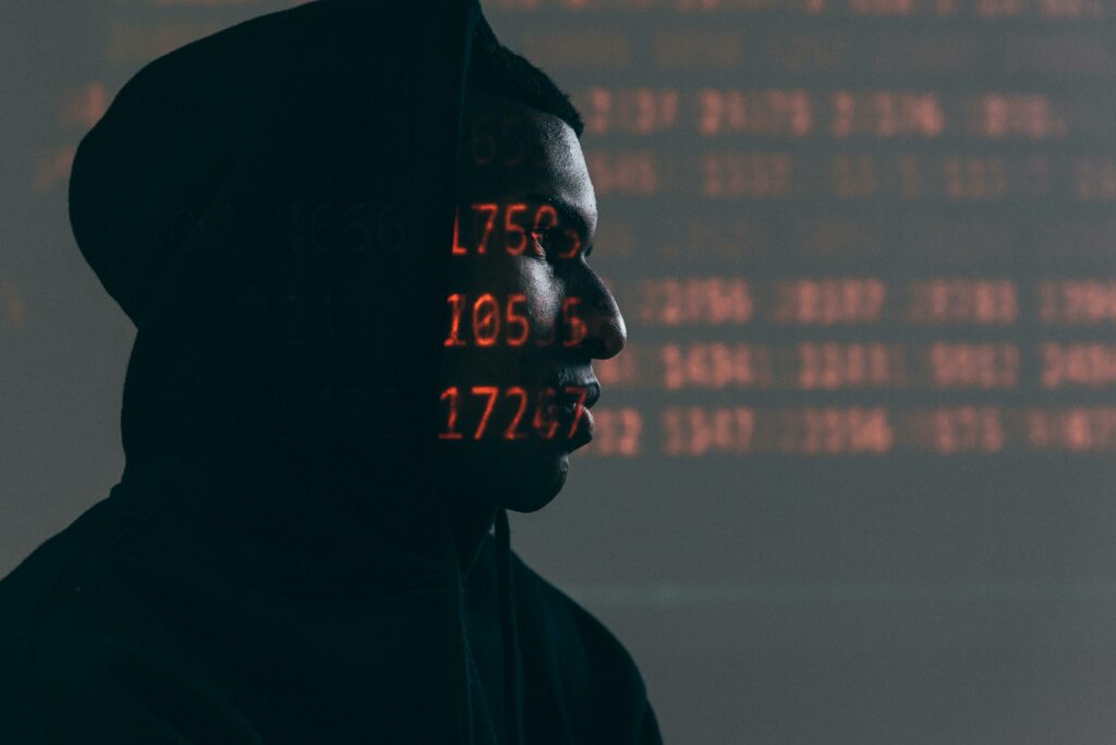 person's profile with numbers projected onto their face
