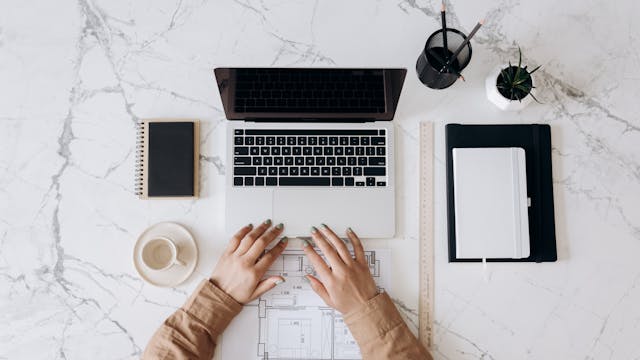 person using laptop