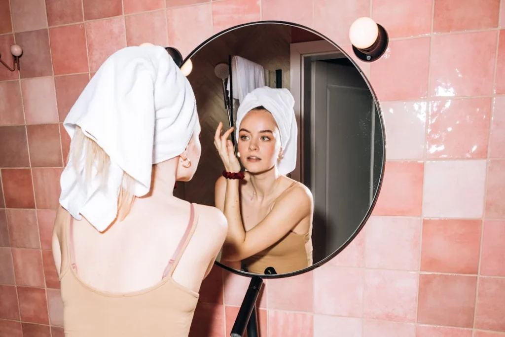 woman in front of a mirror
