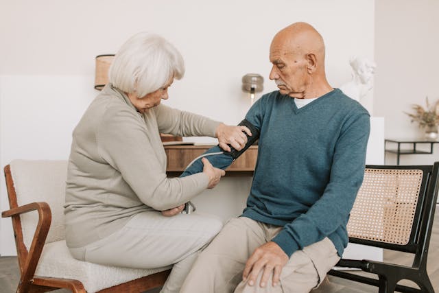 couple checking blood pressure