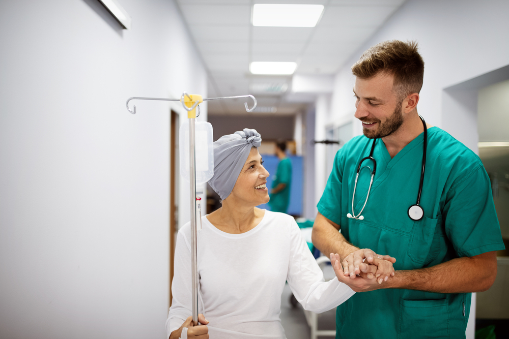 Woman with cancer during chemotherapy recovering from illness in hospital