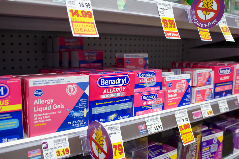 Los Angeles, California, United States - 08-10-2021: A view of several packages of Benadryl Allergy medicine, on display at a local grocery store.
