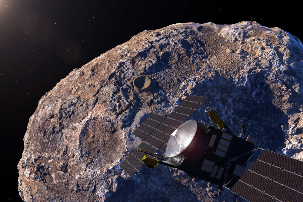 Asteroid Psyche the large iron core of an early planet. Asteroid orbiting between Mars and Jupiter. The Psyche spacecraft will arrive at the asteroid in 2029. This image elements furnished by NASA.