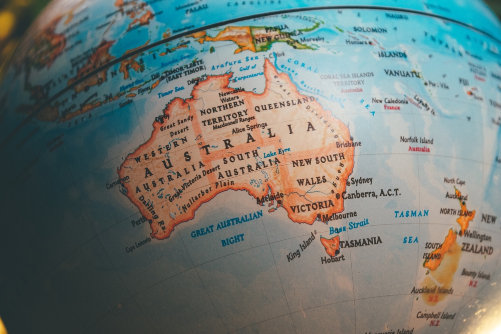Australia on the world globe - a close up shot of the country and continent of Australia and Australian States as seen on a vintage globe \ map