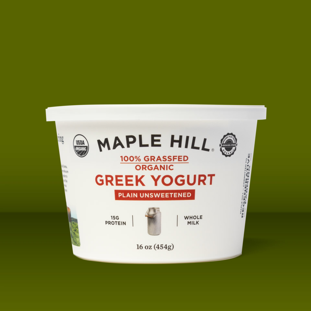 Product shot of Maple Hill Organic Yogurt tub.