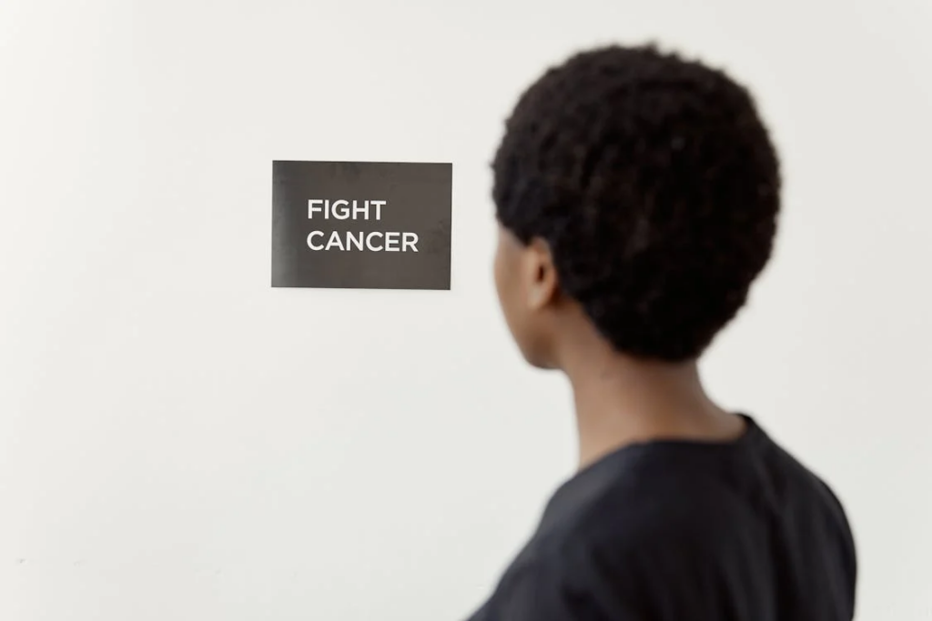 Selective Focus Photo of Brown Signage on the Wall