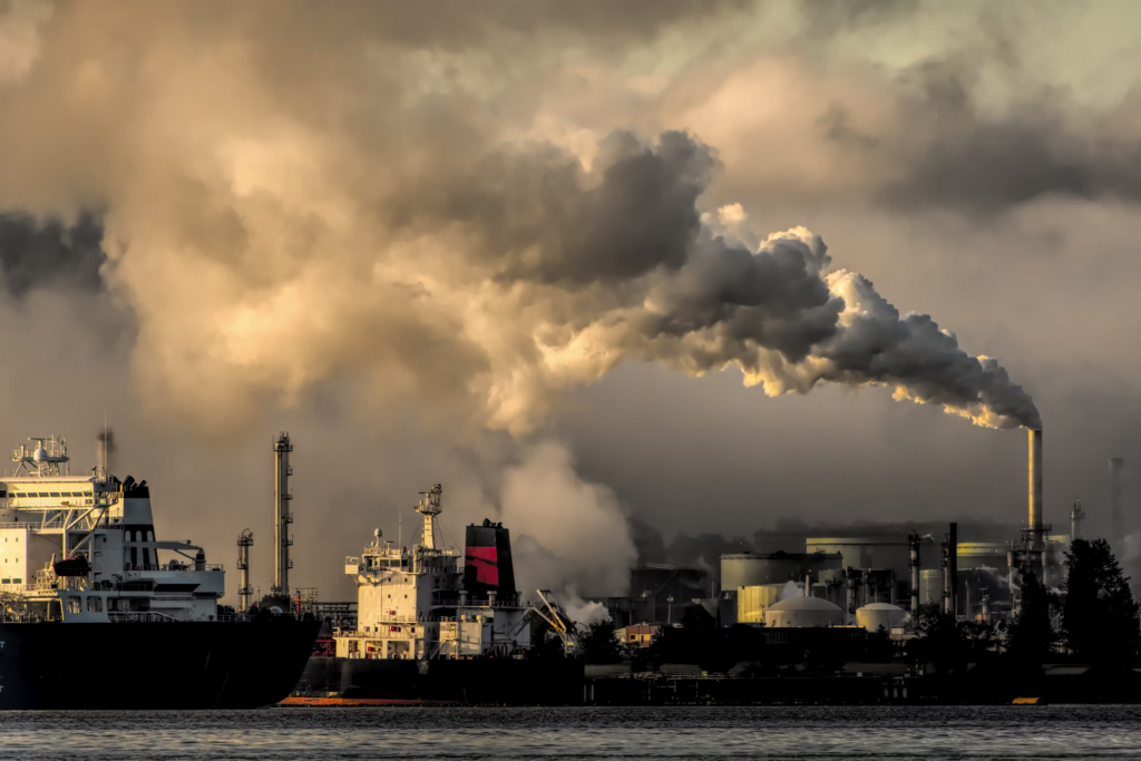 A large ship navigates through the water, symbolizing the need for sustainable energy solutions amidst environmental challenges.