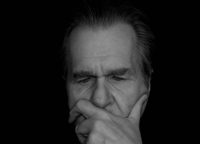 old man deep in contemplation