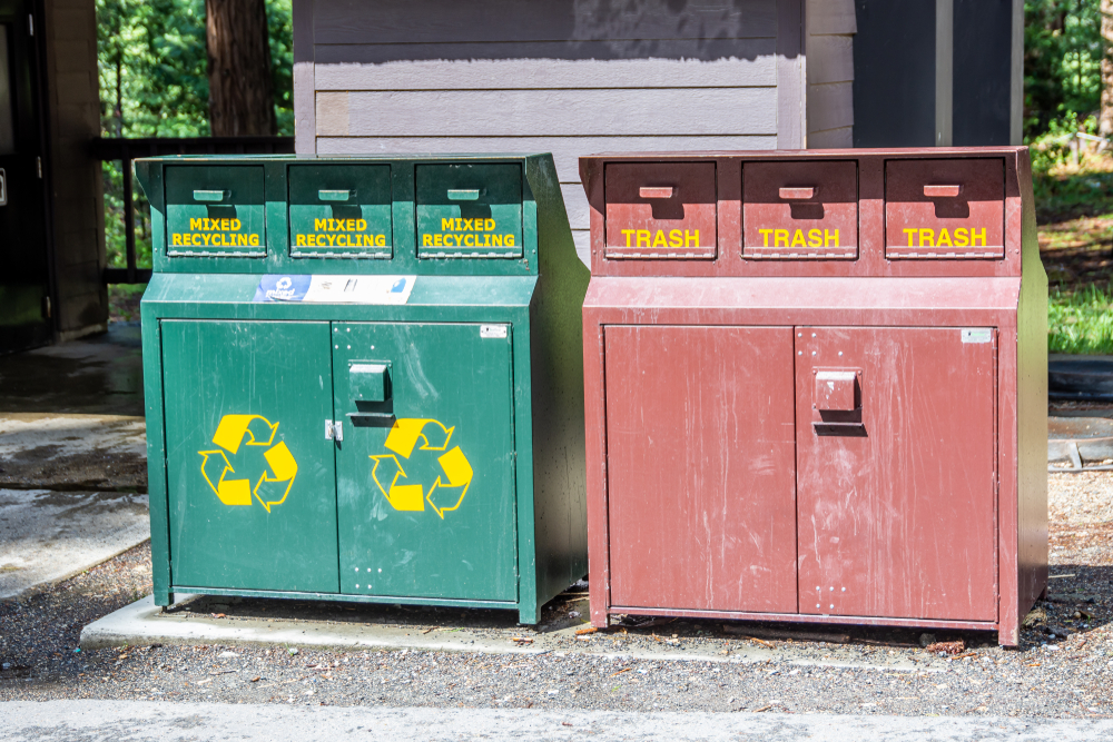 Yosemite National Park, California / USA - May 19, 2019: Bear-proof trash and recycling containers near the restrooms by Swinging Bridge parking lot