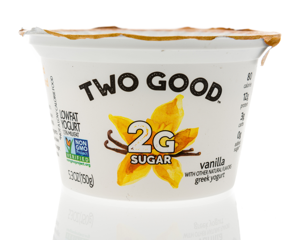 Winneconne, WI - 18 October 2019: A package of Two good greek yogurt on an isolated background