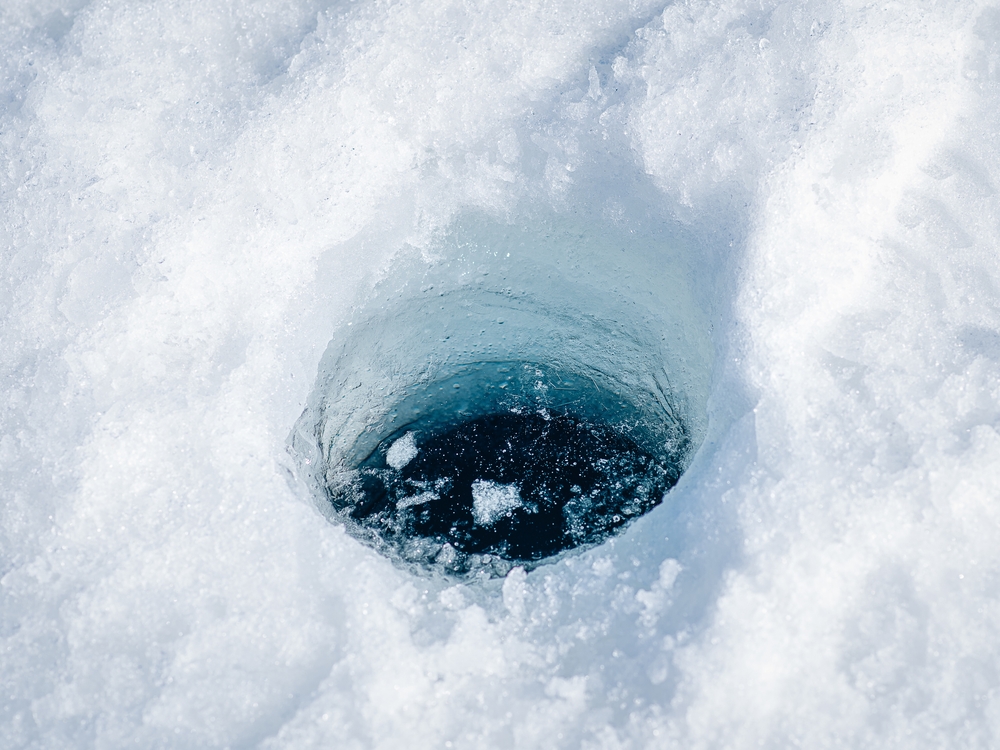 Cored hole for ice fishing