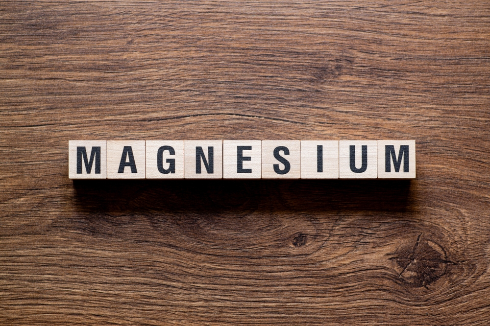 Magnesium - word concept on building blocks, text