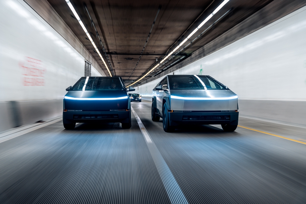 Seattle, WA, USA April 10, 2024 Tesla Cybertrucks driving together in a tunnel
