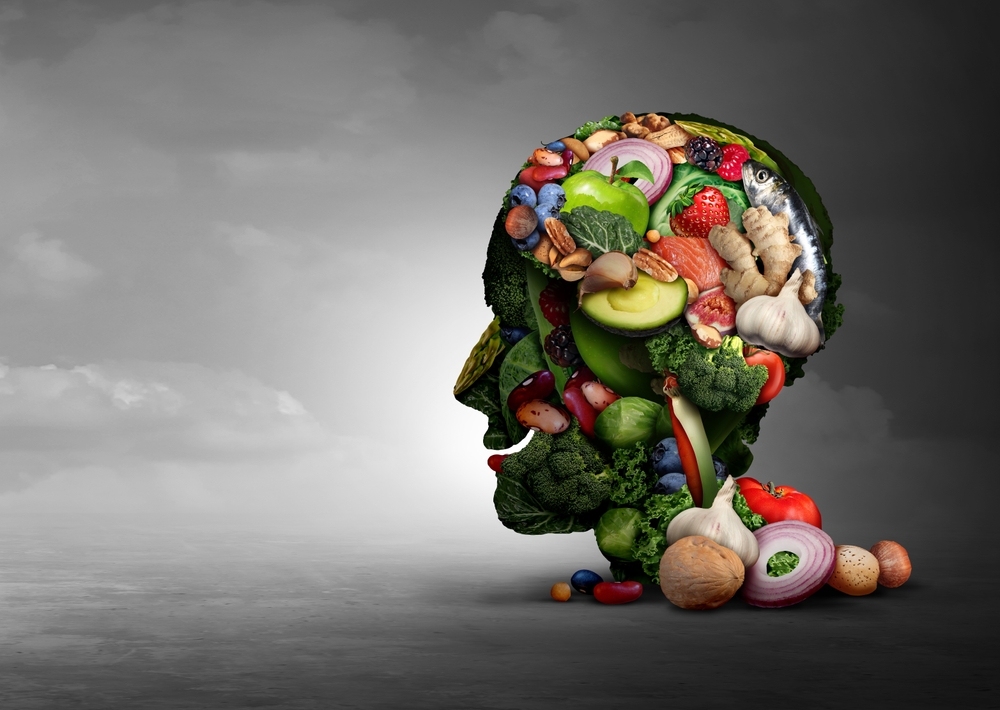 Happiness Diet Eating And Mood Balanced nutrition as mindful eatingor social dining with healthy fat antioxidants as a mood enhancement as gut health food for physical and psychological well being.
