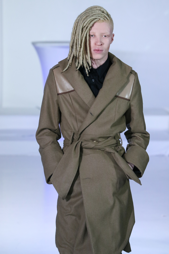 NEW YORK, NY - FEBRUARY 13: Model Shaun Ross walks at Nina Athanasiou Runway at MBFW Fall 2015 at The Designer's Loft on February 13, 2015 in NYC.