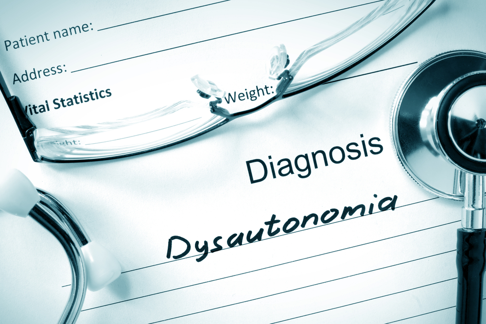 Form with diagnosis Dysautonomia and tablets. Medical concept.
