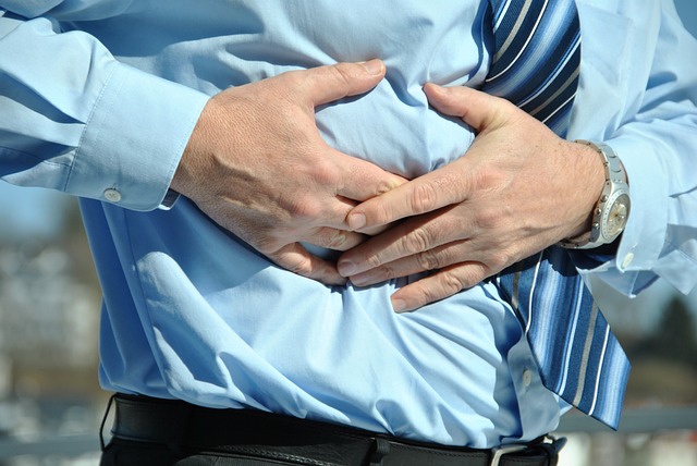 man with abdominal discomfort