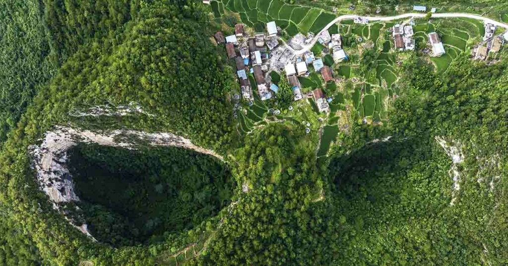 Explore China’s Giant ‘Sinkhole Forest’ - Featured image