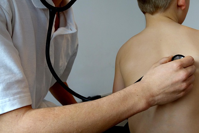 doctor checking lungs