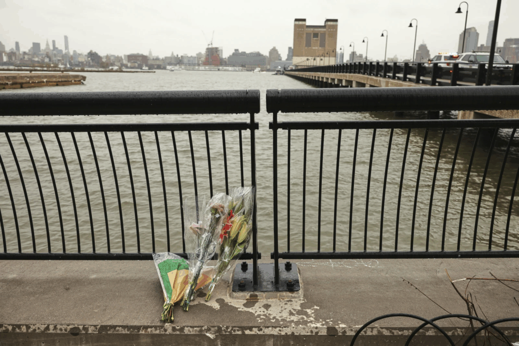 flowers left on a birdge over the Hudson River, in memory of the victims. 