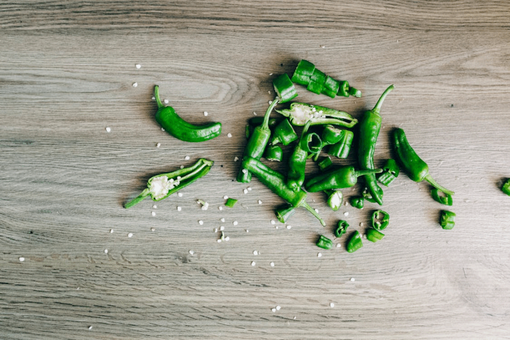 Green Chili on Wooden Surface