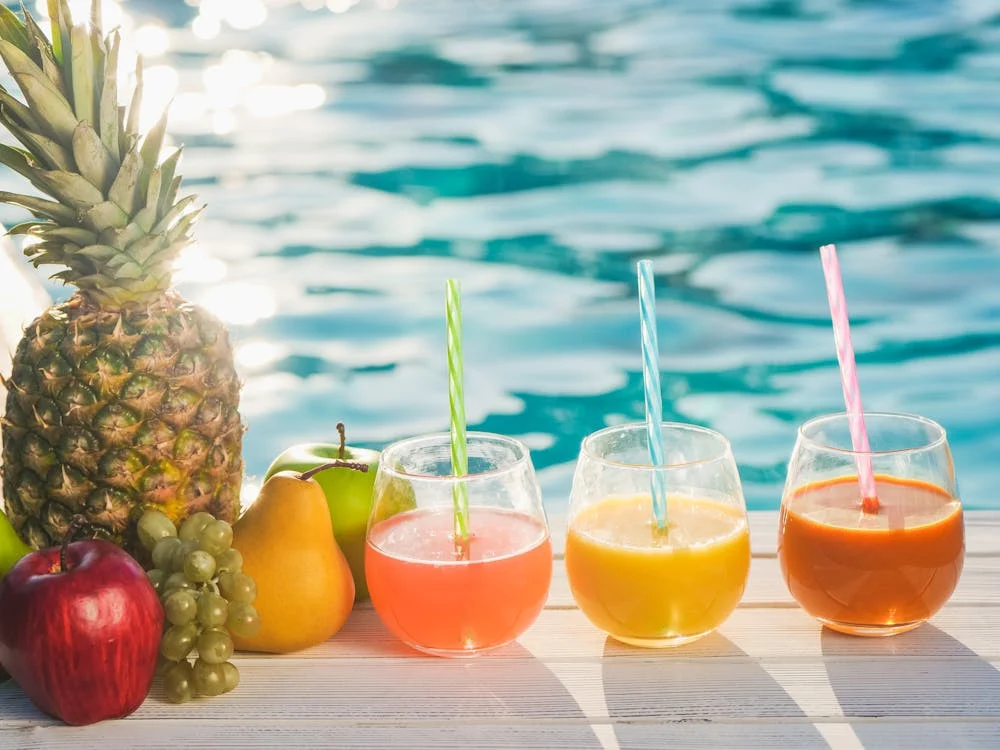 Drinking Glasses with Fruit Juice on the Table